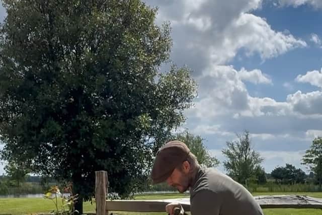 Beckham digging a hole for his David Austin Rose (picture: Instagram David Beckham)