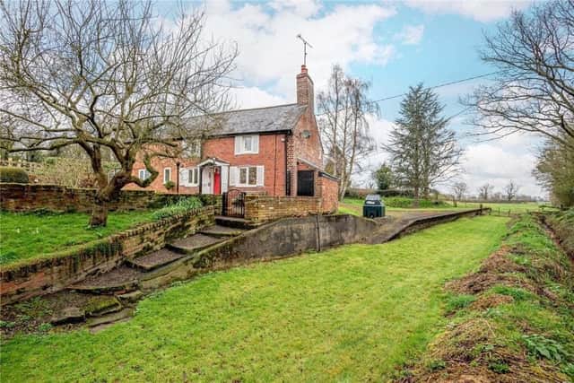 Station House at Arddleen is up for sale for £350,000.