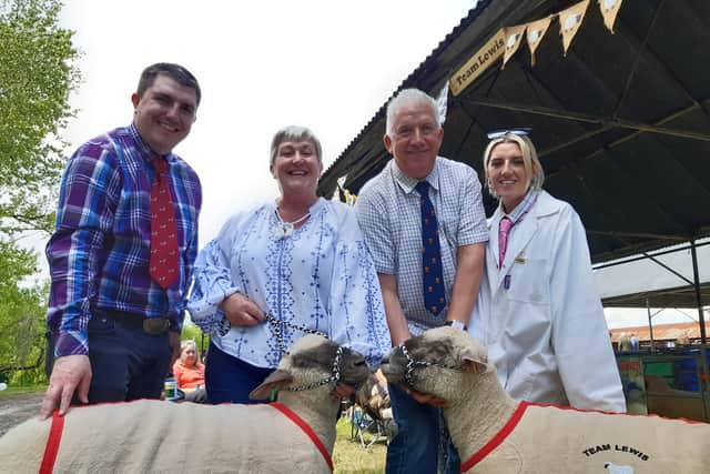 The Lewis family from Uffington: Joshua, Debbie, Pete and Georgia with two of their Dorset Down sheep Adelaide and Daffodil. 