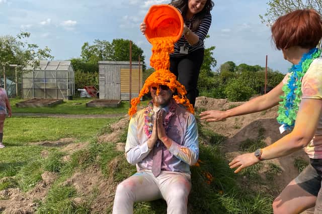 Deputy head, Clare Liley won the honour of gunging headteacher, Ben Crompton