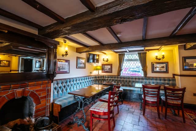 The pub has an open fireplace and a warm feeling
