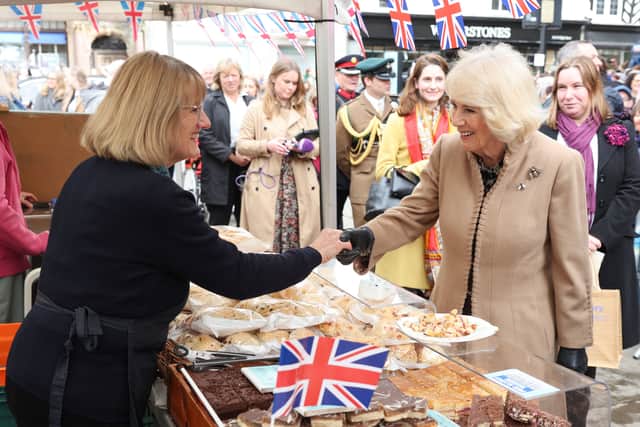 Queen Camilla meets another trader.