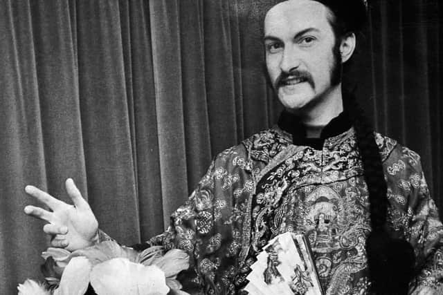 1975 - A whispering wizard, a trick-weaver high-eyebrowed with shiny forehead, he conjures metaphysical marvels around his air-curving, dreaming fingertips.