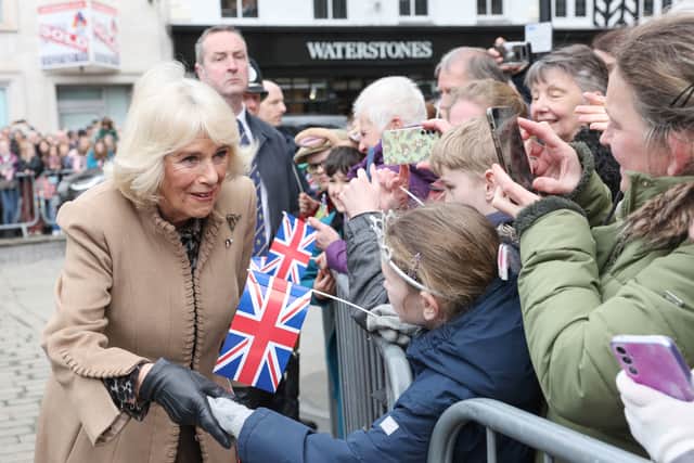 Another image of Queen Camilla meeting well-wishers.