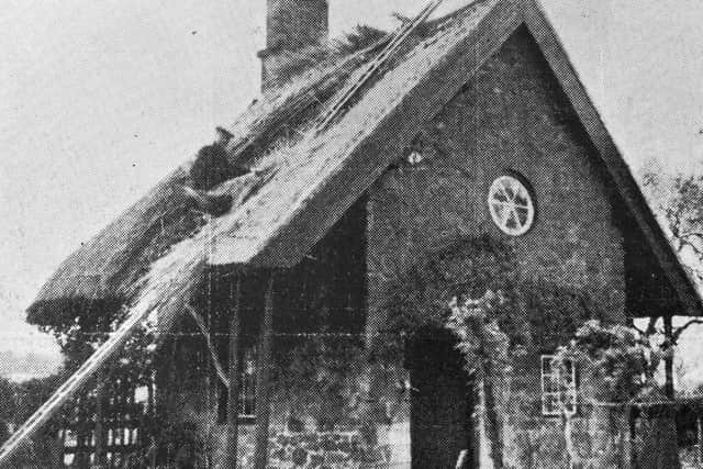 1938 - Lying back off the main Wellington to Shifnal road (sic - Oaken is actually near Codsall) at Oaken is this old-world thatched cottage. It was formerly a coach house where letters were dropped for distribution in the area.