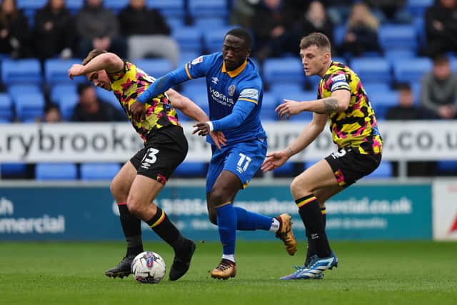 Dan Udoh of Shrewsbury Town and Harrison Neal of Carlisle United (AMA)