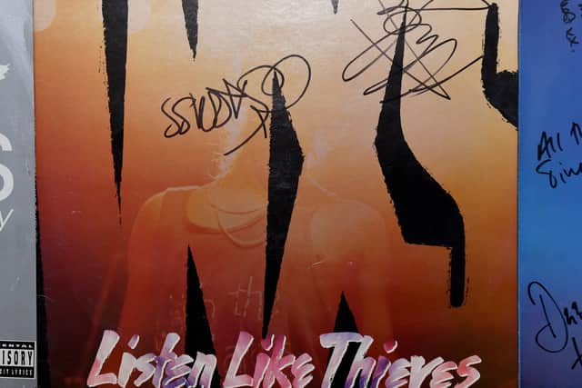 Autographed INXS Listen Like Thieves album sleeve