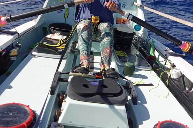 Mark doing a rowing stint