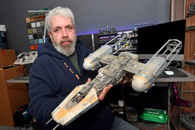 Guy with one of the in-progress 'Bill George Y-Wing' models