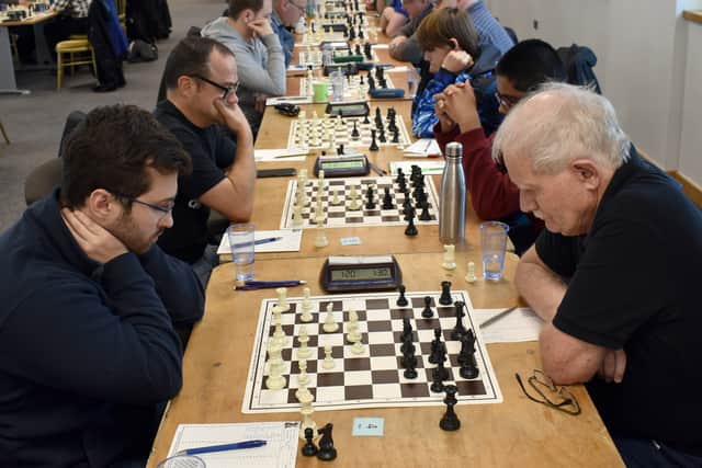 Eyes down for players in the Major section.