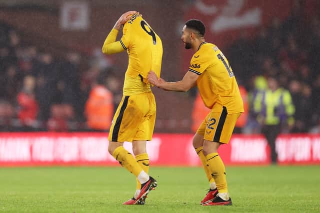 SHEFFIELD, ENGLAND - NOVEMBER 04: Fabio Silva of Wolverhampton Wanderers is consoled by teammatMatheus Cunha following the team's defeat during the Premier League match between Sheffield United and Wolverhampton Wanderers at Bramall Lane on November 04, 2023 in Sheffield, England. (Photo by Jack Thomas - WWFC/Wolves via Getty Images).