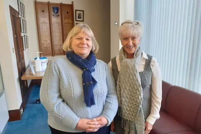 Farmer Isobelle Robinson with metal detectorist Caroline Parkinson at the inquest at Shirehall