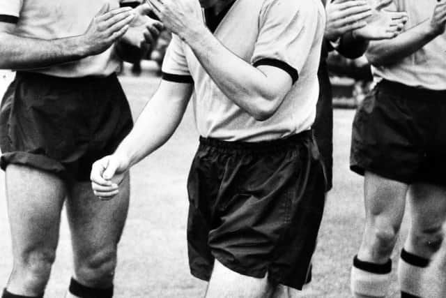 Billy Wright is applauded as he rather shyly takes the pitch at Molineux for the last time for an August 1959 pre-season practice game