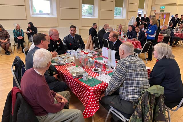The Duke talks with members of the Models for Heroes groups.