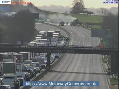 Smoke can be seen coming from the vehicle on the M6. Photo: National Highways: West Midlands