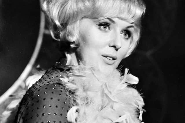 Janie Marden in an ATV publicity photo in the Shropshire Star picture library. The caption pasted on the back reads: 'Transmission Date: Sunday, July 13th. In tonight's show Liberace has as his guests Tessie O'Shea, Cliff Richard, and Janie Marden. Picture: Janie Marden.' No year date is given, but it is probably mid-1960s.