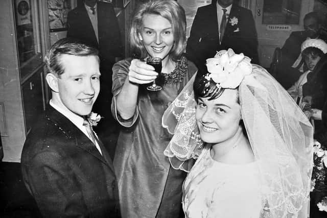 Janie Marden, a 1960s singing star originally from Broseley, raising a glass at a family wedding in Shropshire on March 20, 1965. Her real name was Janet Instone. 