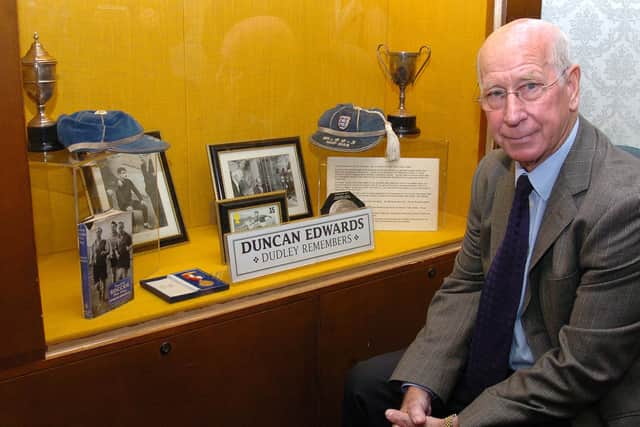 Before officially opening the refurbished Priory Park in Dudley in 2006, Sir Bobby Charlton looked at some items from the town's Duncan Edwards museum.