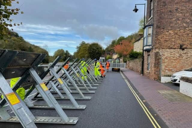Flood barriers go up in Ironbridge. Photo: @EnvAgencyMids