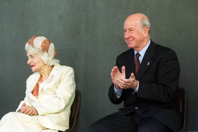 Sarah Anne Edwards and Sir Bobby Charlton preparing to unveil the Duncan Edwards statue in 1999