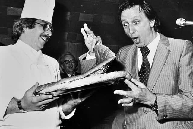 A giant jam butty for comedian Ken Dodd at a reception in Dawley Town Hall in September 1980 to commemorate the opening of the town's new traffic-free area. It was served up by fellow Liverpudlian, Telford Development Corporation's caterer David Alexander, of Wellington.