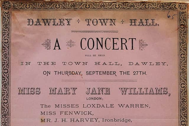 A poster, believed to be from 1883, for a concert at the hall.