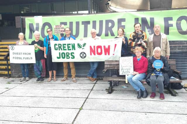 Campaigners from Extinction Rebellion and Fossil Free Shropshire outside Shirehall