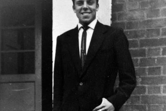 Norman, dressed in his smart suit, ready to set out on his bicycle for his first date with Sylvia.