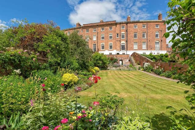 The terraced house has sprawling lawns