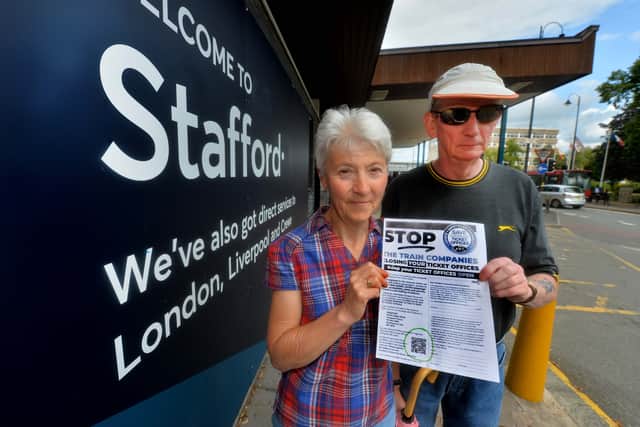 Alison and Mark Howard from Stafford pictured with a leaflet about ticket office closures.