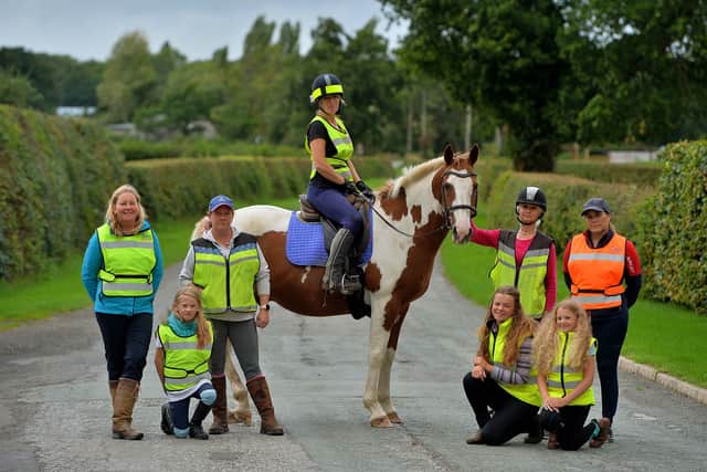 Ahead of the Kinnerley Pass Wide and Slow ride are Tara Jones, on her horse Neddy, with fellow campaigners