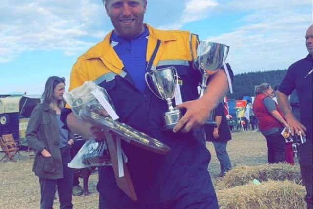 Will 'Choc' Roberts with his ploughing trophies Picture: Whittington & Oswestry Young Farmers' Club