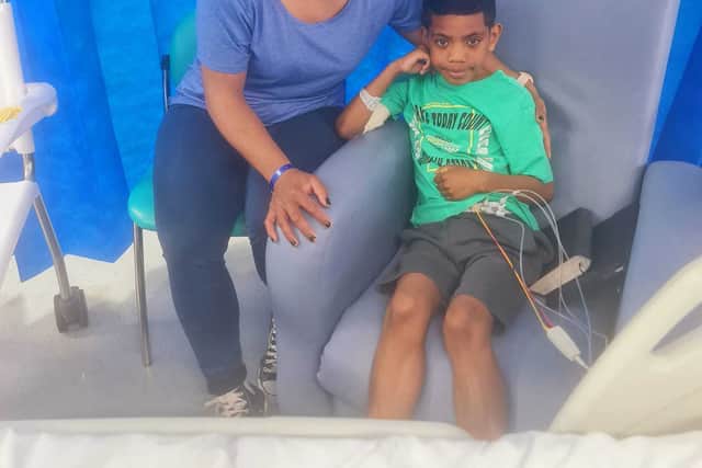 Mary Tamani and Denzel who is making a good recovery after collapsing at a Telford trampoline park (picture Mary Tamani - Facebook)