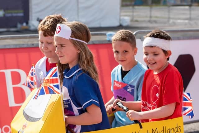 Darcey and friends Josie, James and Jack completing the AJBell Great Birmingham Run last Sunday for West Midlands Ambulance Service