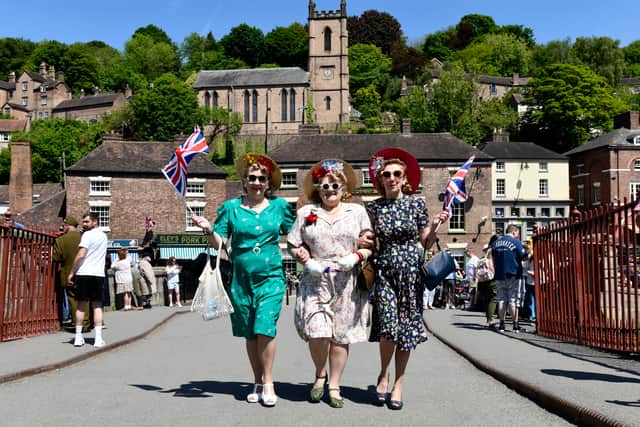 The Ironbridge World War Two Weekend. Sisters dressed in 1940s style walking over the world's first Ironbridge. Picture: Dave Bagnall
