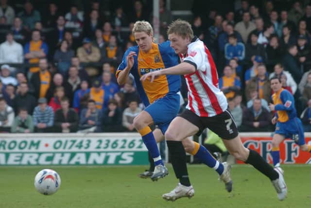 Dave Edwards in action for Salop against Cheltenham Town at the Gay Meadow