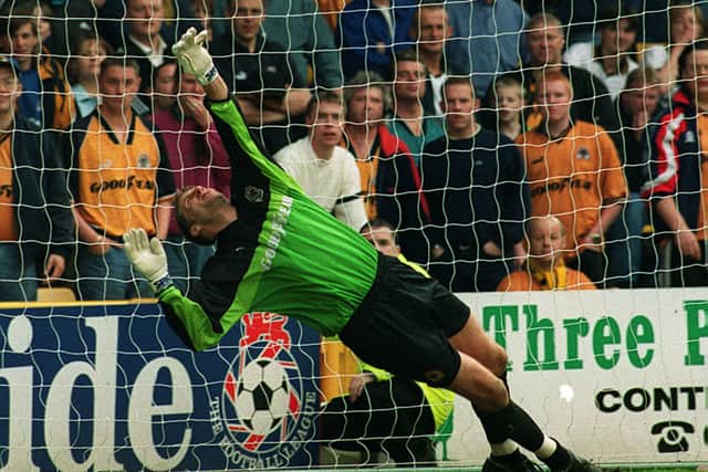 Wolves keeper Mike Stowell makes magnificent penalty save against Bradford at Molineux.