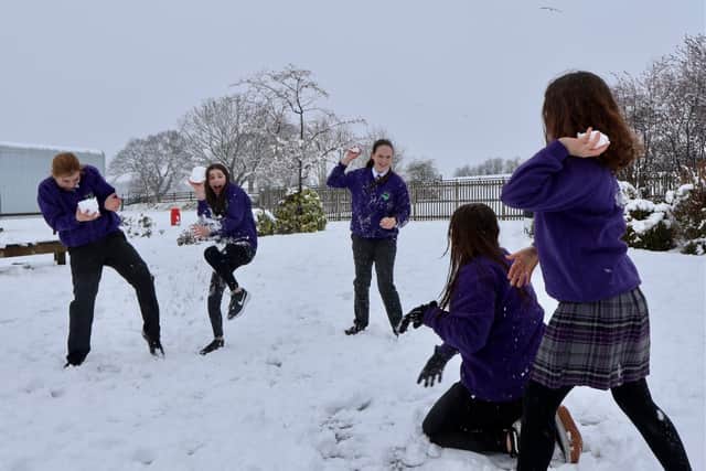 Students having fun in the snow at St Martins School