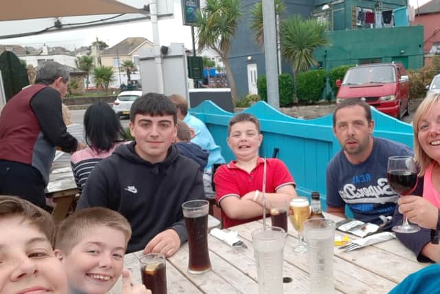 Emma and the family, including Kean (second from left)