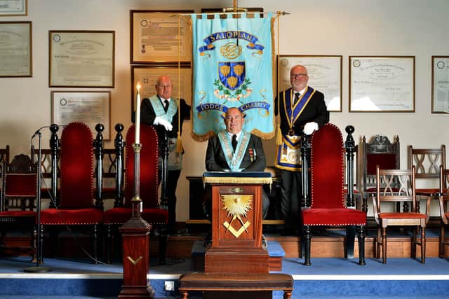 In the middle is Master Russell Price with him past Master Shaun Willocks and Chaplin of the Lodge David Foulkes