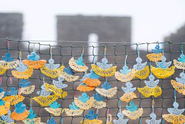 The artwork is made up of 500 hand-made angels, each representing a child killed in the war in Ukraine.