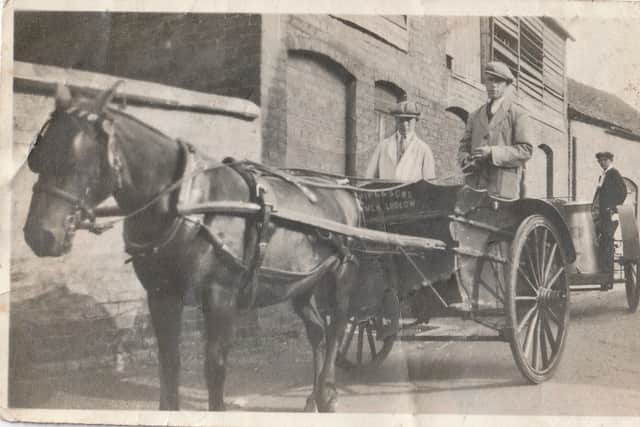 Pipe & Sons Dairymen of Ludlow. Photo taken approx. 1940s with Allan Pope (front right) driving the milk cart in St Mary's Lane