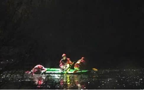 Emergency personnel search the lake on Sunday (Jacob King/PA)