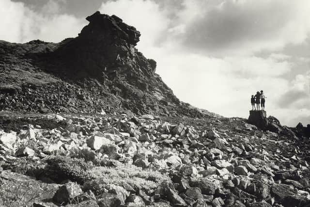 Some young visitors take a look at the Devil's Chair on the Stiperstones in 1958. Picture: S.R. Turner