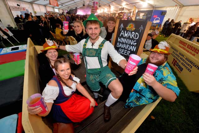 In the TG Skip bars is front: Charlotte Douzi, her brother: Luke Thomas and his brother: Ben Thomas, 27, at the back is: Kim Murphy,  Maddie Rowen, Tom Evans. From Wellington and Herefordshire..