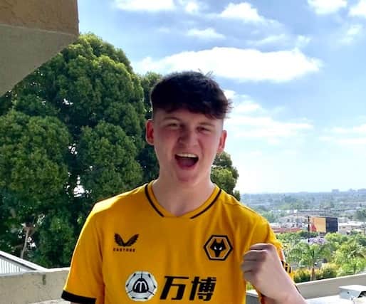 Son Aden in Wolves colours