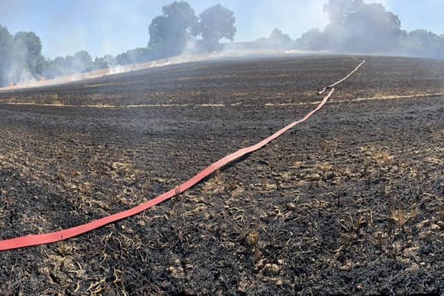 Crews from Hereford Fire & Rescue attending the crop fire in Tenbury Wells