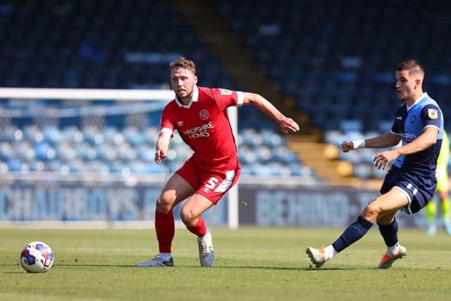 Matthew Pennington of Shrewsbury Town and Anis Mehmeti of Wycombe Wanderers (AMA)