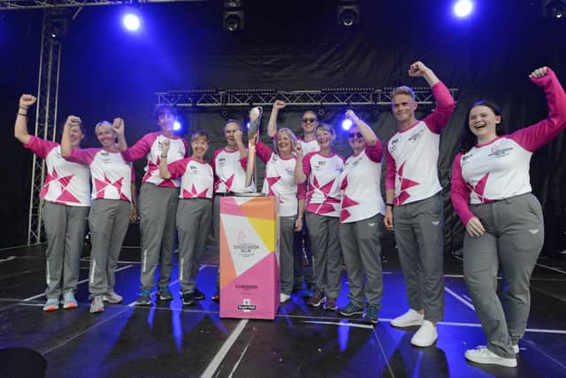 Baton-bearers for the Queen's Baton Relay, on stage at The Quarry