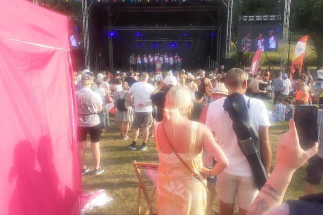 Crowds cheers the arrival of the baton on stage at The Quarry in Shrewsbury
